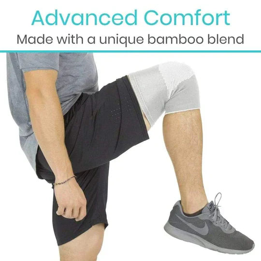 Person wearing black shorts with text about advanced comfort and bamboo blend